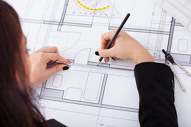 istock Businesswoman Making Blueprint 525302201