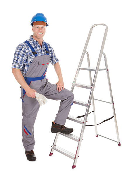 istock Confident Repairman With Ladder 525316531