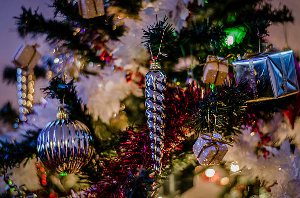 istock close up photo of a christmas tree with decorations 525317229