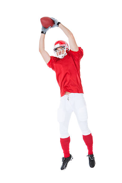 istock American Football Player Catching Ball 525317293