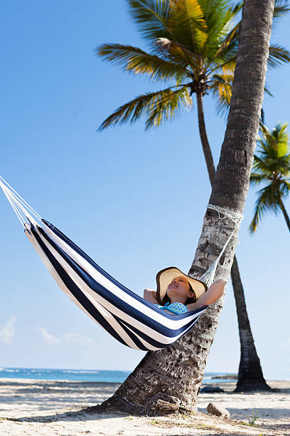 istock Woman In Hammock At Beach 525317317