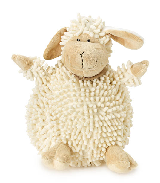 istock sheep toy isolated on the white background 525318075