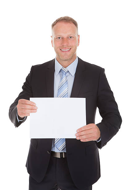 istock Confident Businessman Holding Wooden Plank 525318159