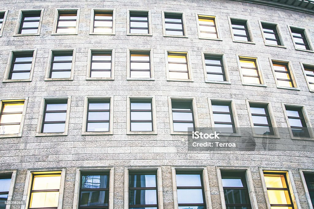 Office Building Office Building with blue and yellow windows. Abstract Stock Photo