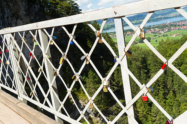 Love  locks padlock. This is on Marys Bridge, overlooking Neuschwanstein Castle, Bavarian Alps, Germany, Europe.