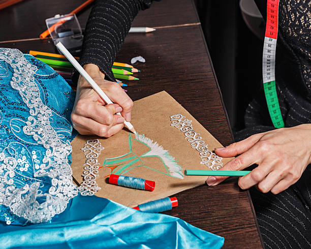 istock Sketches fashion designer 525320335