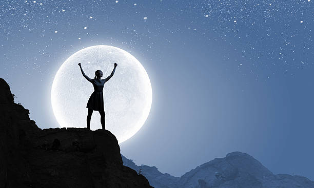istock Woman and full moon 525320751
