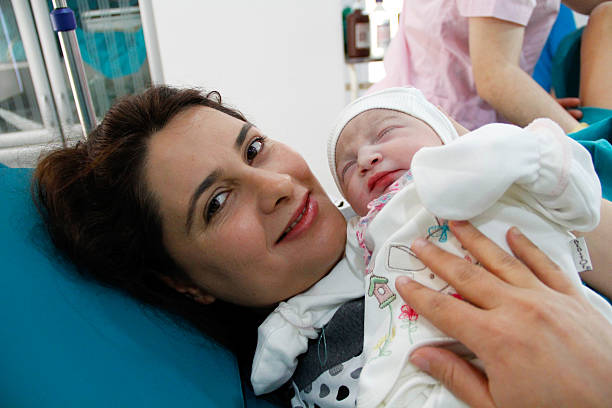 istock Newborn and Mother in hospital 525321071