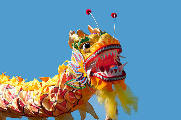 istock Chinese New Years Dragon against Blue Sky 525325813