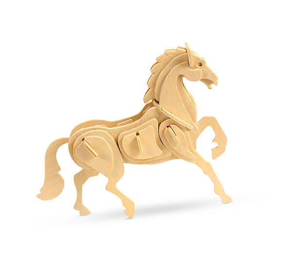 istock Wooden horse on white background 525325845