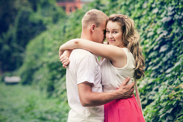 istock Loving couple portrait in park 525326559