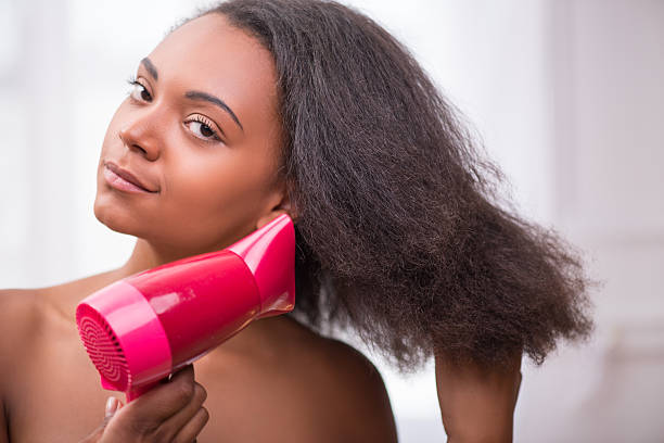 istock Beautiful  dark skinned girl in white towel 525327565