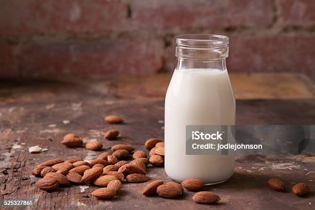 Almond Milk In A Glass Jar With Almonds Stock Photo - Download Image Now - Milk, Accuracy, Adulation