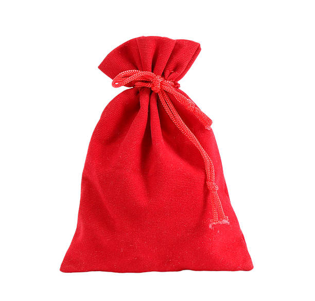 istock Red velvet bag isolated on white background 525327967