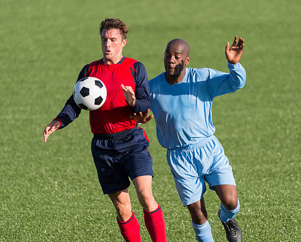 istock Two Football Players In Action 525328691