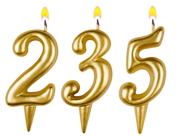 istock candles number two hundred thirty five isolated on white 525330859