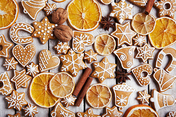 istock Christmas gingerbread cookies and dried orange 525331733