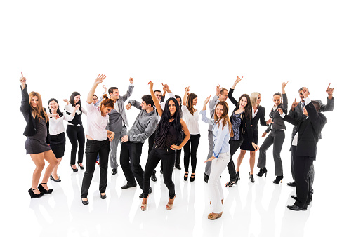 Large group of cheerful business people dancing and having fun. Isolated on white.  