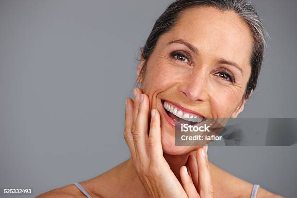 Her Beauty Is Still As Radiant As Ever Stock Photo - Download Image Now - Mature Women, Skin Care, Beauty