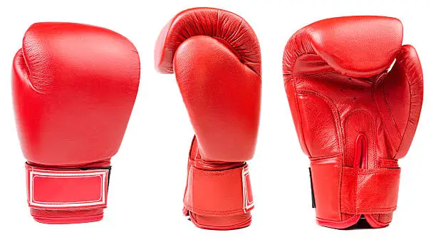 Photo of Red leather boxing glove isolated