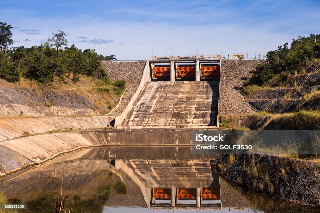 Spillway of a hydro electric dam. Spillway of a hydro electric dam in Kiw Ko Ma Mountains of Lampang Thailand.Spillway of a hydro electric dam in Kiw Ko Ma Mountains of Lampang Thailand. Accidents and Disasters Stock Photo