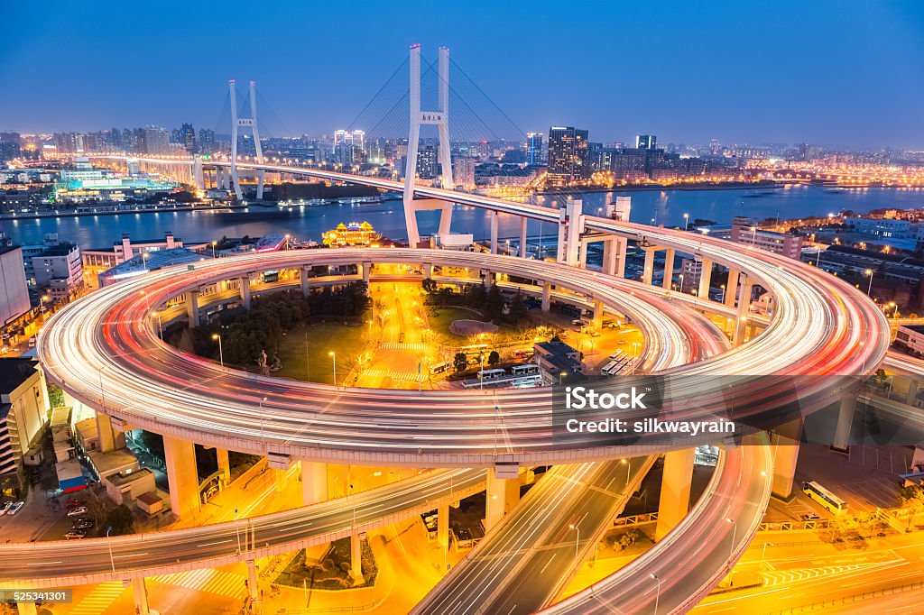 beautiful nanpu bridge in nightfall beautiful nanpu bridge in nightfall at shanghai , China Aerial View Stock Photo