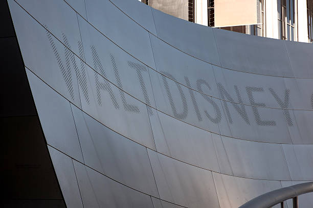 Los Angeles, California - December 4, 2024: Close-up view of the entrance steps and the wavy metallic facade with the 'Walt Disney Concert Hall' inscription.