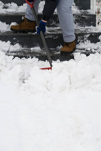 istock Shoveling snow in the winter 525341936