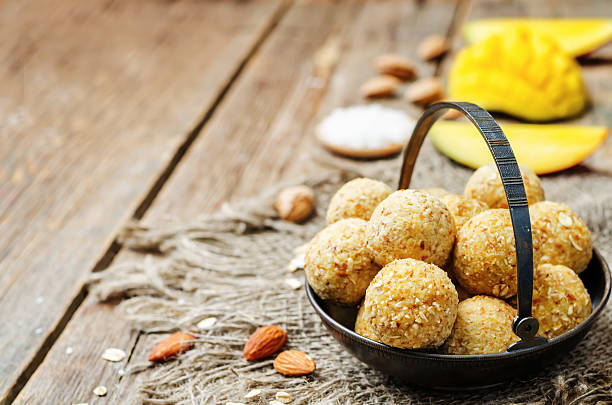 istock raw vegan mango coconut almond balls 525342420