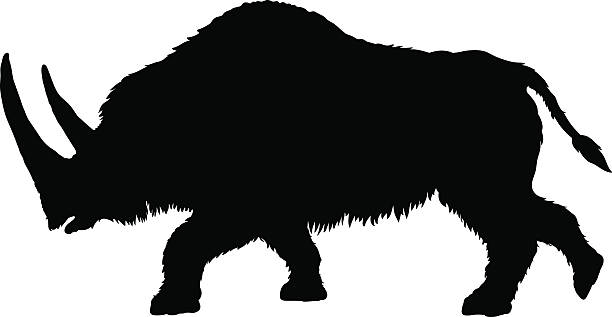 istock Silhouette of a running woolly rhinoceros 525342804