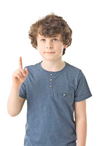 Portrait Of 8 Years Old Boy Pointing Stock Photo Download Image Now portrait-of-8-years-old-boy-pointing-stock-photo-download-image-now