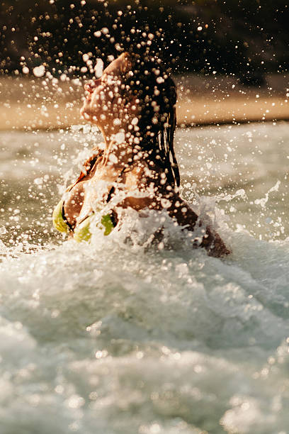 istock sexy girl sea waves splash 525342968