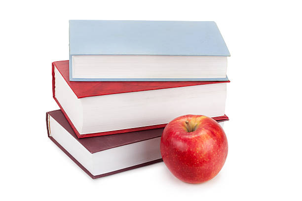 tapa dura libros y manzana - book stack dieting textbook fotografías e imágenes de stock