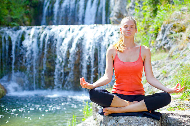 istock Woman practising yoga 525343698