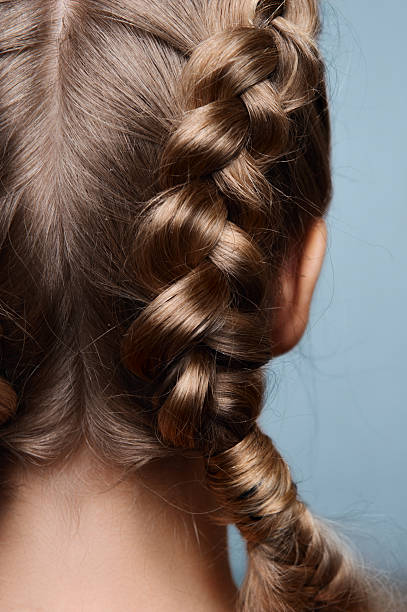 istock Beauty model with pigtails from back 525344083