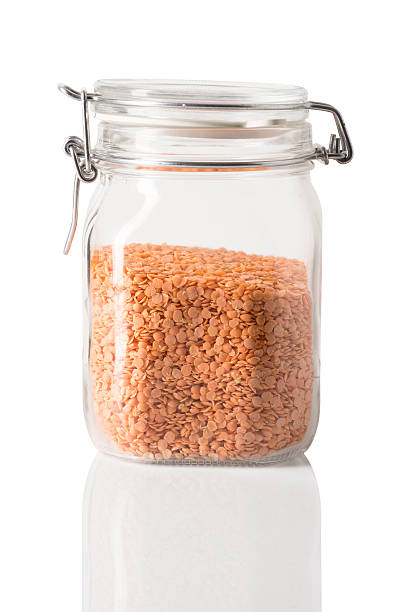 Red Lentils in a Jar - Closed stock photo