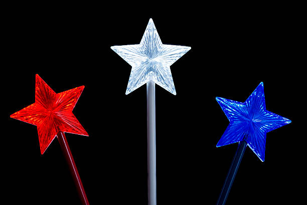 istock Red, White and Blue stars on black background 525344452