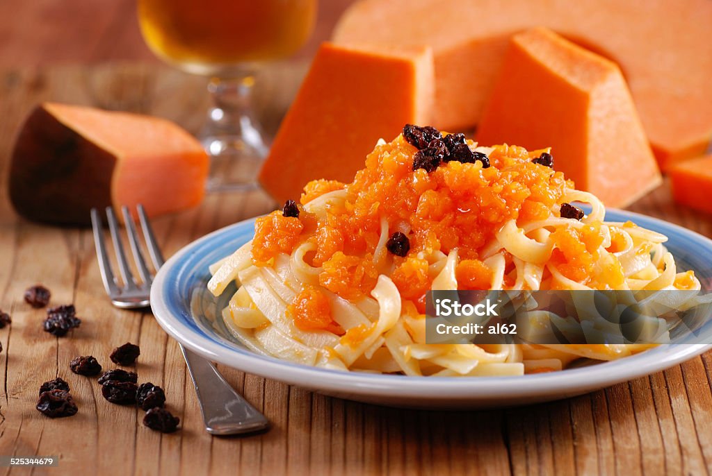 pasta with pumpkin pasta with pumpkin and raisins - Italian recipe Close-up Stock Photo