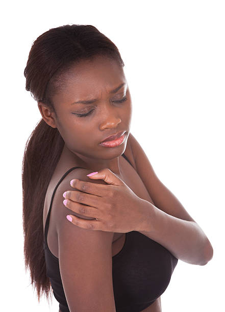 istock Woman in undergarments suffering from shoulderache 525345213