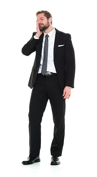 istock Upset businessman looking away 525345402