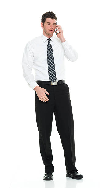 istock Upset businessman talking on phone 525345982