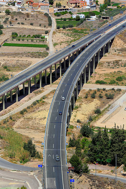 istock Highway road junction transportation infrastructure city 525346268