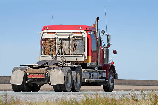 istock Semi Tractor Trailer Truck Cab, Rear Quarter View 525346306