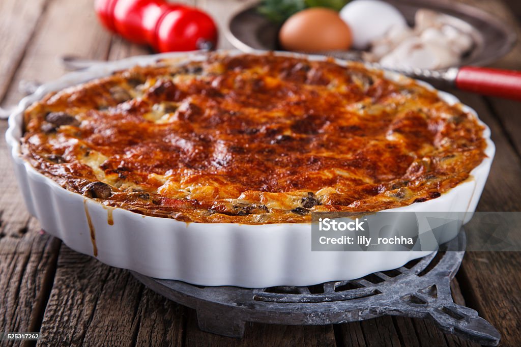 Pie quiche with mushrooms Pie quiche with mushrooms.selective focus. Backgrounds Stock Photo