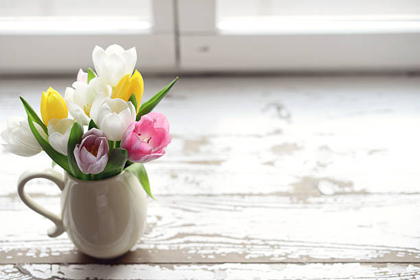 istock Tulip on a wooden background 525347676