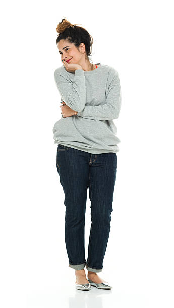 istock Smiling woman standing and looking away 525348994