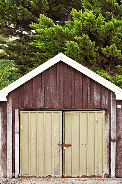 istock Boat sheds on the beach 525349818