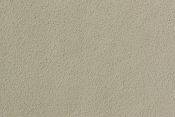istock Texture of grey gravel concrete wall. 525351386