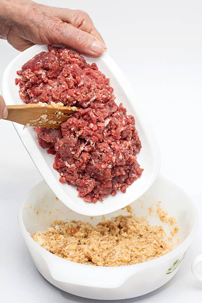 istock Preparing the mix for the stuffed meatloaf 525351492