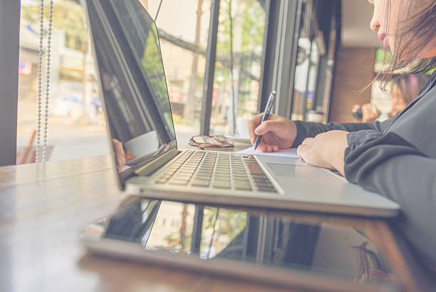 istock Woman writing letter instead of sending email or texting message 525351664